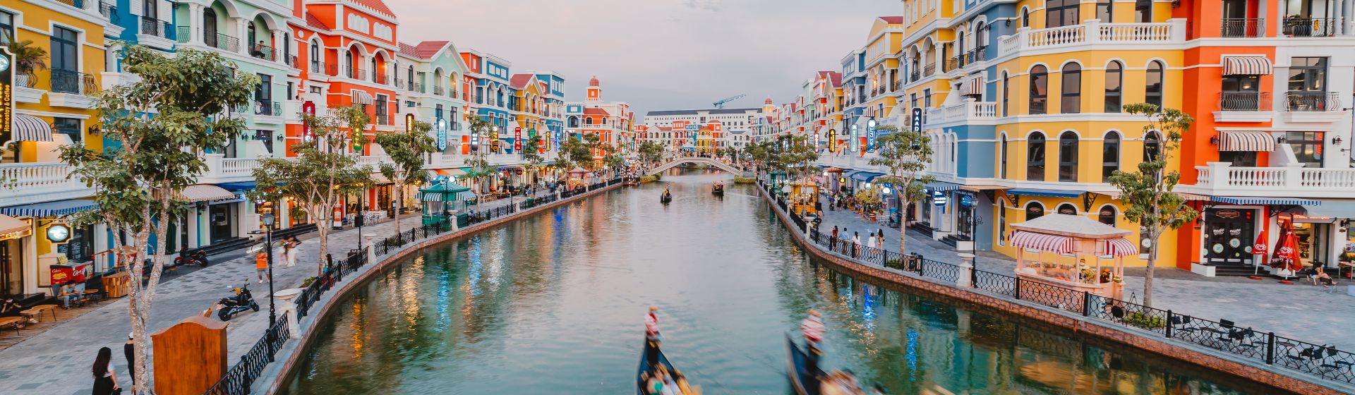 View of two boats flowing down the river at Grand World Phu Quoc Theme Park, Vietnam