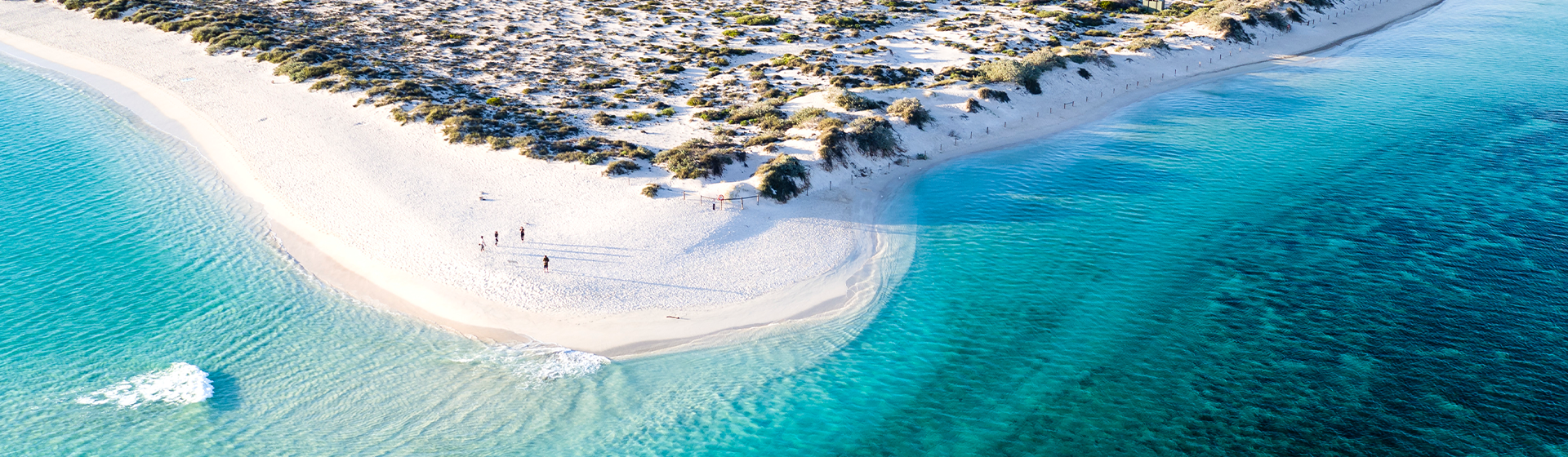 Aerial view of white sand beach and azure waters at Turquoise Bay in Exmouth, Western Australia
